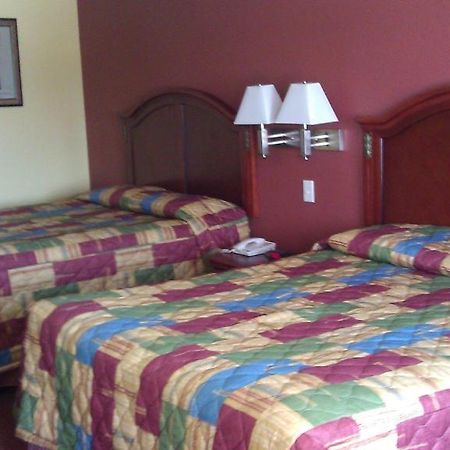 Scottish Inns Suites East Sam Houston Pkwy North شانيلفيو الغرفة الصورة