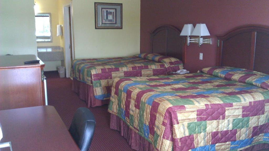Scottish Inns Suites East Sam Houston Pkwy North شانيلفيو الغرفة الصورة