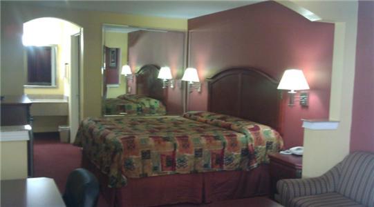 Scottish Inns Suites East Sam Houston Pkwy North شانيلفيو الغرفة الصورة